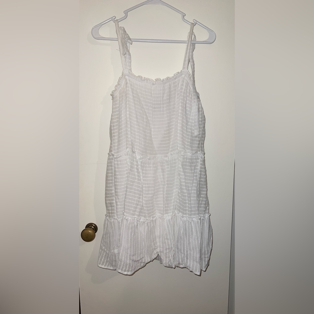 white, bell-shaped, knee high dress